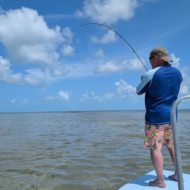Angler casting a fly line on the Grand Bahama flats